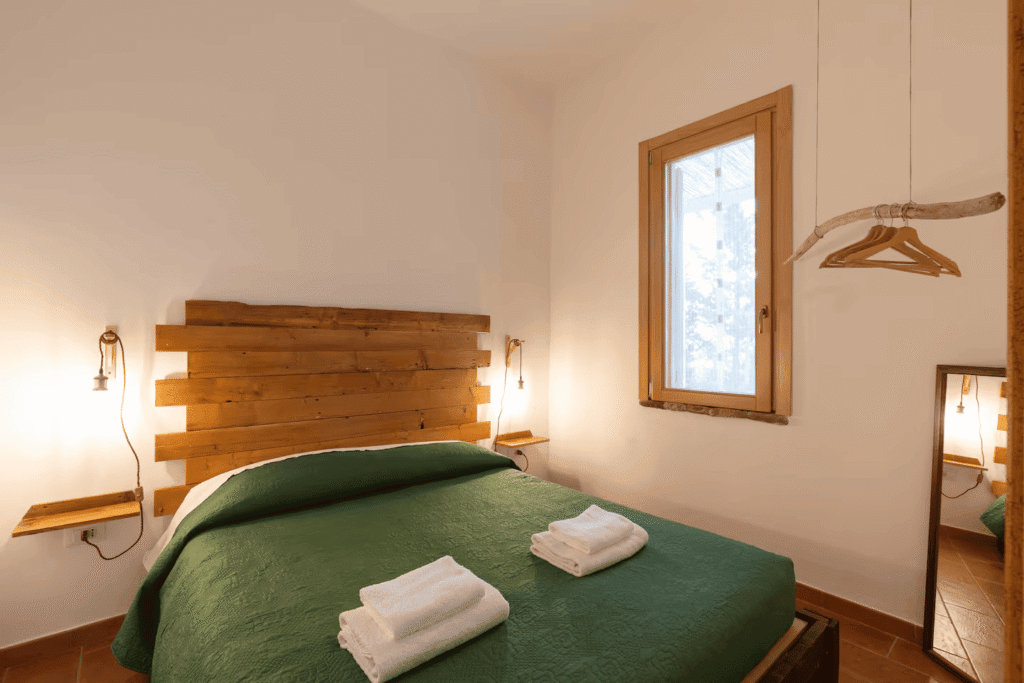 camera da letto casa delle pigne valdibella